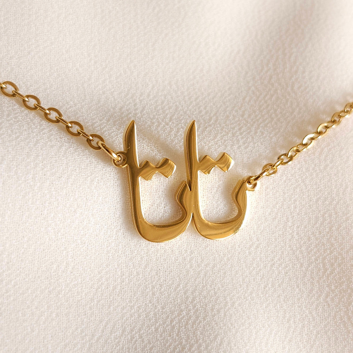 Gold Arabic calligraphy name necklace Tata (تاتا), personalized waterproof hypoallergenic jewelry by Sensalik