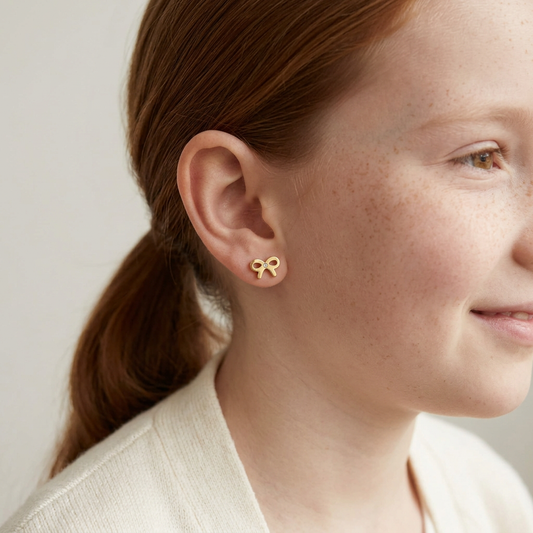 Bow Tie Stud Earrings model preview