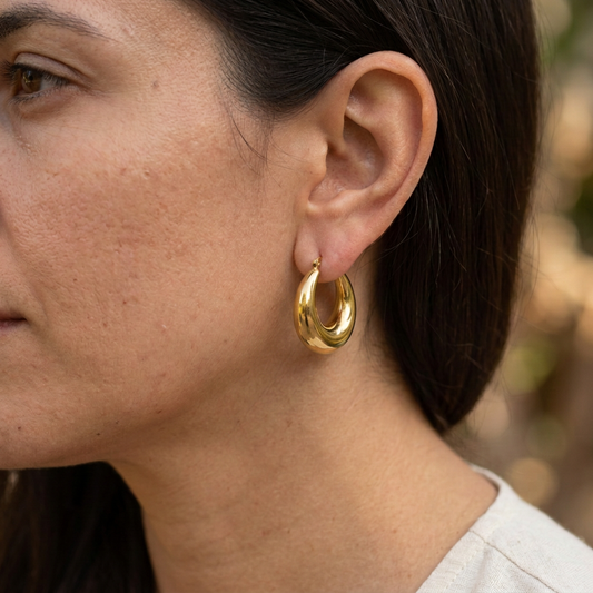 Close-up portrait with Bold Crescent Earrings about 25% smaller
