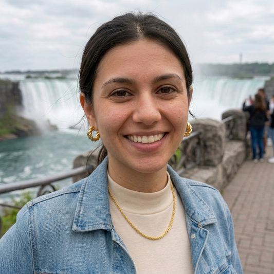 Model looking directly at the camera with the preferred pose at Niagara Falls