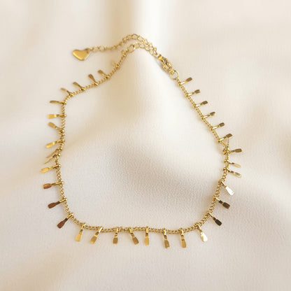 Chaîne de cheville à pompons