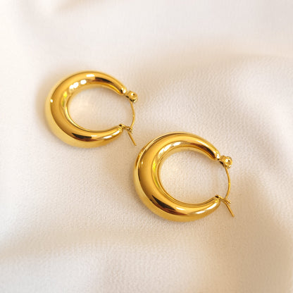 Boucles d'oreilles créoles audacieuses