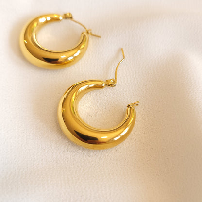 Boucles d'oreilles créoles audacieuses