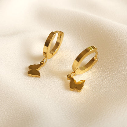 Boucles d'oreilles pendantes papillon en or
