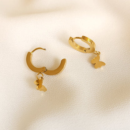 Boucles d'oreilles pendantes papillon en or