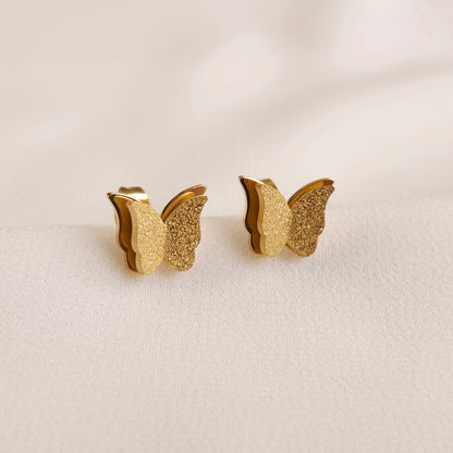 Boucles d'oreilles clous papillon étincelantes