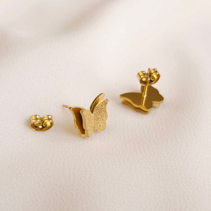 Boucles d'oreilles clous papillon étincelantes