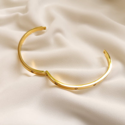 Crystal Stud Bangle opened wide to show its hinge, clasp and smooth interior.
