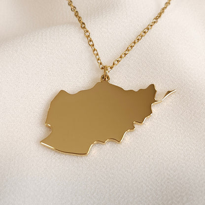 Gold-tone Afghanistan map pendant necklace with a fine oval-link chain.
