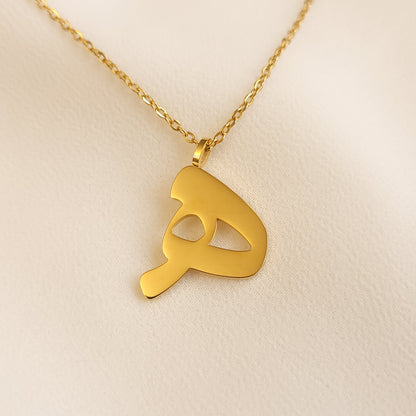 Gold-tone Arabic Initial Necklace with the letter Haa (ه) on a fine link chain.

