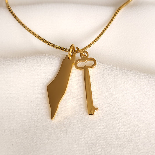 Gold-tone Palestine Key Necklace with a Palestine map pendant and vintage-style key charm on a box chain.
