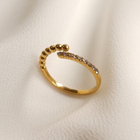 Gold Beads and Sparkle Ring with an open band, rounded gold beads and a row of clear stones