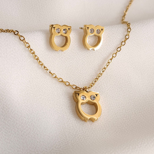 Gold Owl Set with a matching owl pendant necklace and stud earrings featuring clear stone eyes and open centres