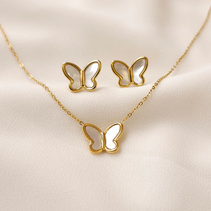 Mother of Pearl Set with a gold butterfly pendant necklace and matching stud earrings featuring pearly white wings.
