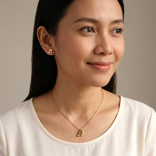Professional studio portrait with the music-note jewelry set