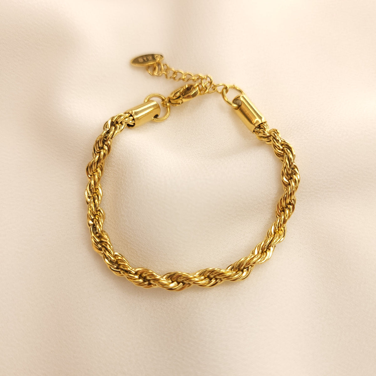 Children's Rope Bracelet arranged in a circle, showing the intertwined gold-tone rope links and adjustable extension chain.