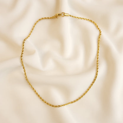 Essential Rope Necklace arranged in a loop, showing its full length and clasp at the top.